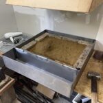 Construction with sand pit