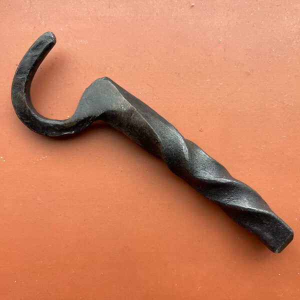 Bottle opener with curled tail 2
