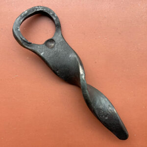 Bottle opener with single twist