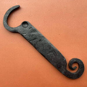 Bottle opener with spiral tail